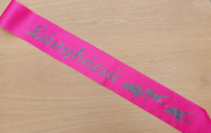 Leánybúcsú  vállszalag pink Lánybúcsú fekete csillámos felirattal