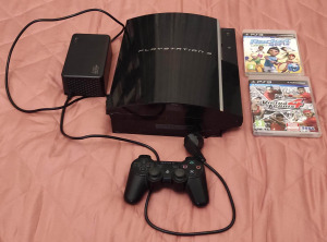 PS3 (Playstation 3) két darab játékkal, kontrollerrel